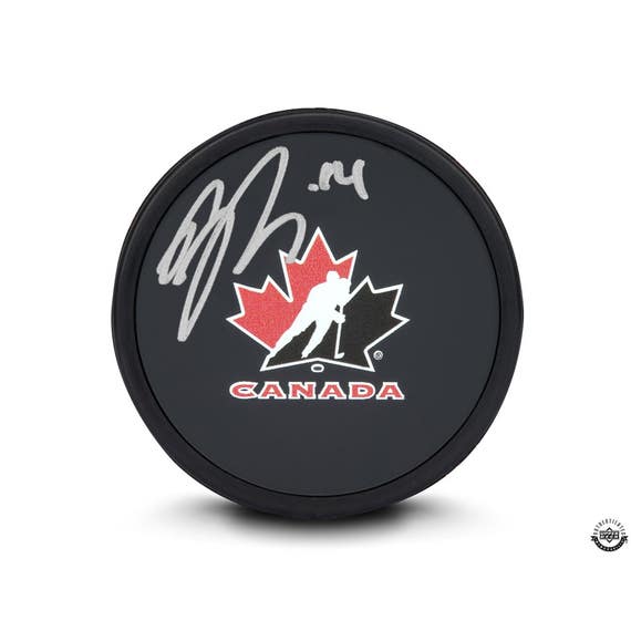 Nick Suzuki Autographed Black Team Canada Rubber Hockey Puck - Miraj Trading